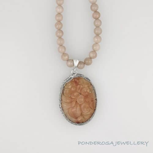 Carved  Stone Pendant with Moonstone